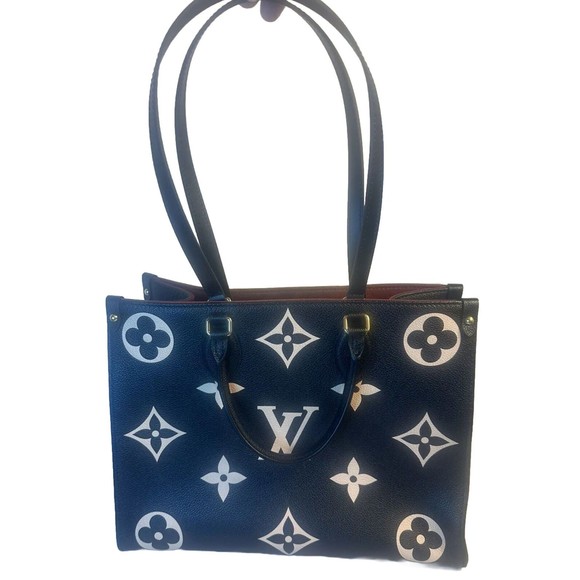 Louis Vuitton Handbags - LOUIS VUITTON ON THE GO MM TOTE BAG BICOLOR EMPREINTE LEATHER M45495